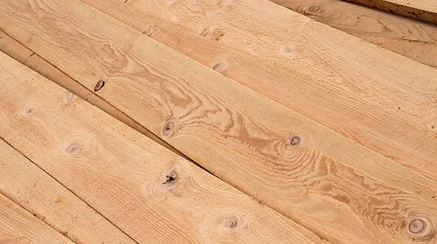 Hemlock boards cut at an Amish sawmill to use in building constructionClick on banner for similar images: