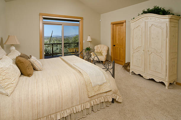 istock Modern master bedroom with elegant armoire 184116032