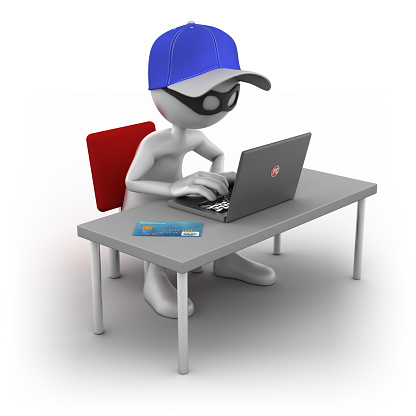 3d Thief at computer with credit card, isolated/clipping path
