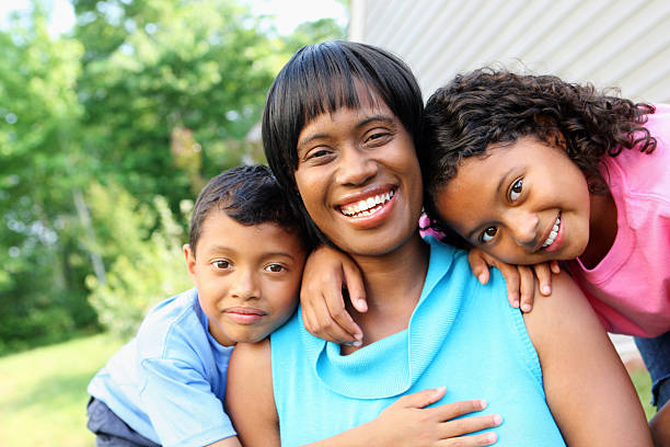 istock Mother with her kids 184117218