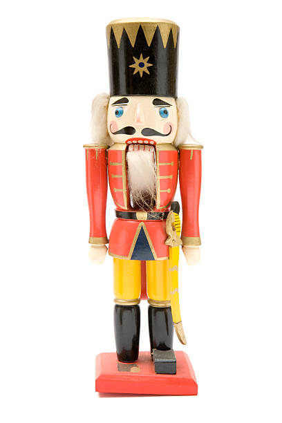 Vintage Red Nutcracker Soldier Antique Christmas nutcracker isolated on a white background. nutcracker photos stock pictures, royalty-free photos & images