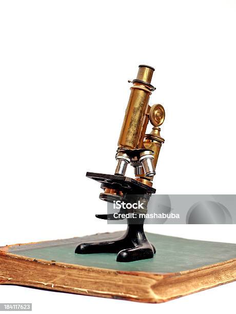 Microscope On The Book Stock Photo - Download Image Now - Analyzing, Antique, Biochemistry