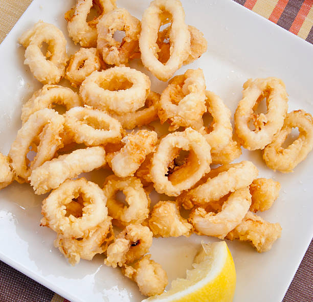 Squid Andalusian close-up of a plate of calamari  in typical Andalusian styleMore like this calamari stock pictures, royalty-free photos & images