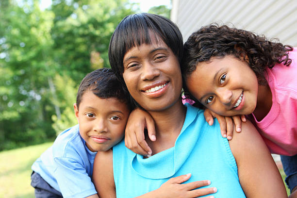 istock Mother with her two kids portrait 184117881