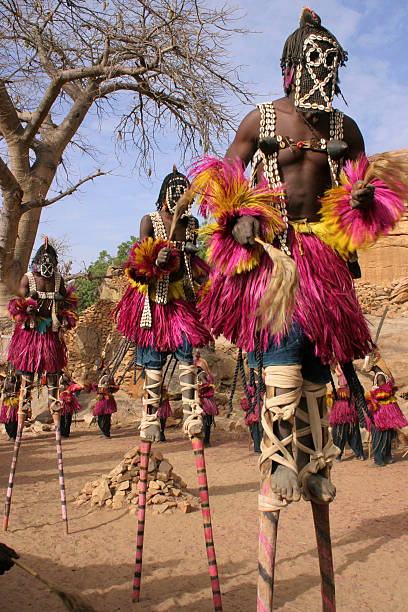 Dogon Dancers, Mali "Dogon masked dancers in the village of Irelli, Mali, 2004.To see my favorite Dogon photo, click its thumbnail below  :" mali stock pictures, royalty-free photos & images
