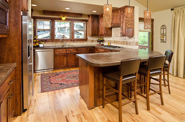 istock Modern kitchen with hardwood cabinets and floor 184118510