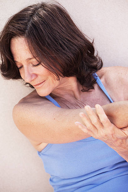 istock Beautiful Mature Woman Exercising 184119469