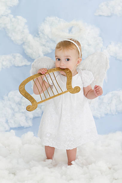 istock Little angel with harp 184119700
