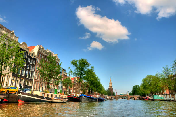 istock View along Singel canal in Amsterdam to Munttoren tower 184120327