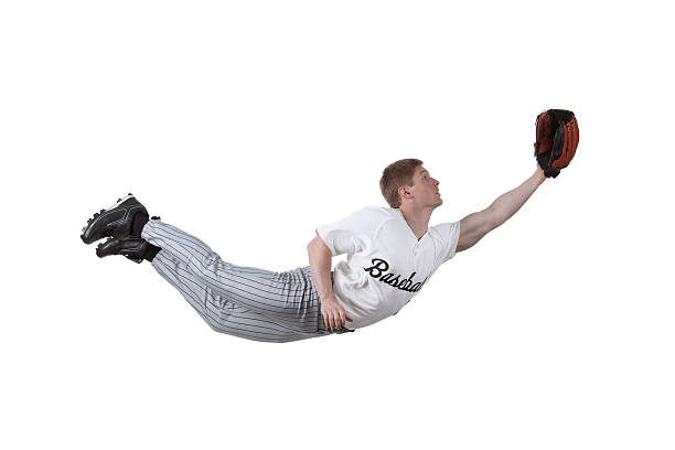 istock Basesball player diving to catch the ball 184120360