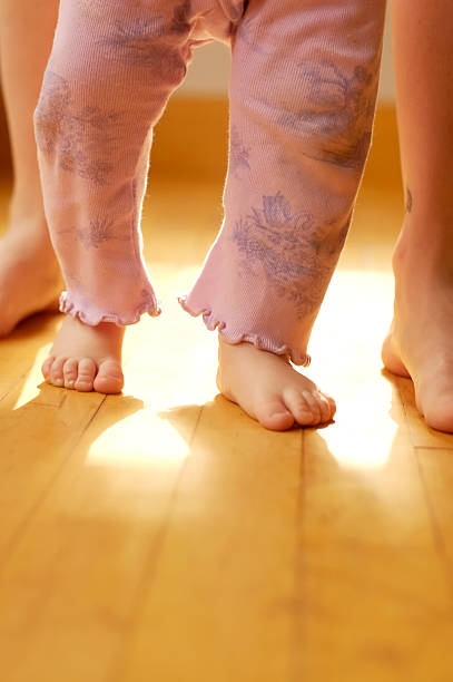 The first steps of our babies are simply magnificent stock photo