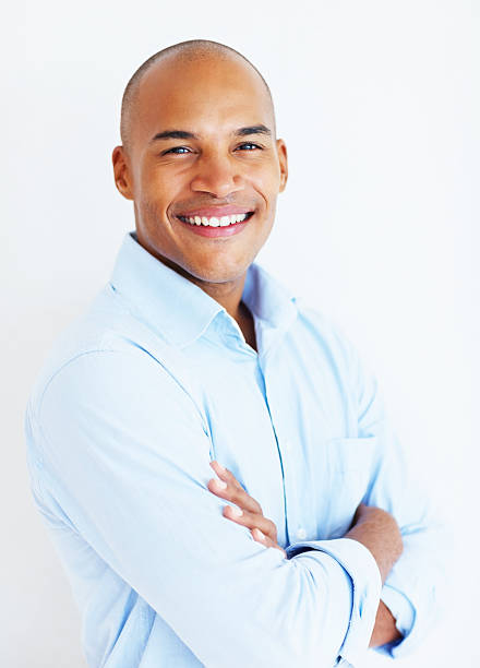 istock Confident business man standing with crossed arms 184121391