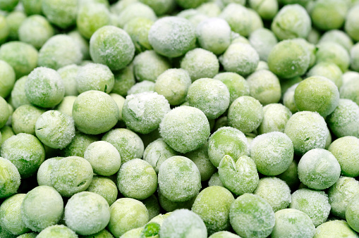 Background of frozen garden peas