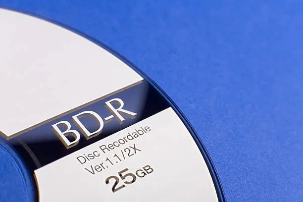 Macro shot of a Recordable Blu-ray Disc (BD-R) with a capacity of 25GB.