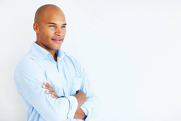 istock Young man standing with arms crossed 184121891