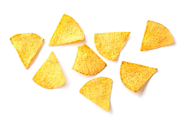 Loose tortilla chips on a white background stock photo