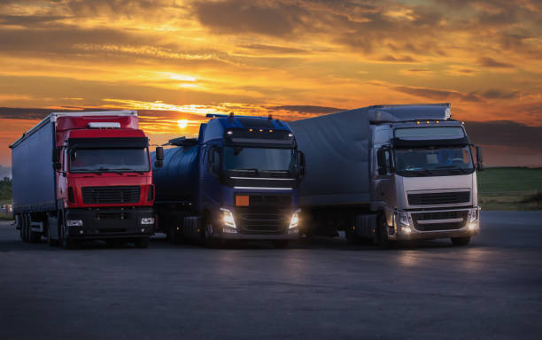 istock Trucks at sunrise in parking lot 1841224151