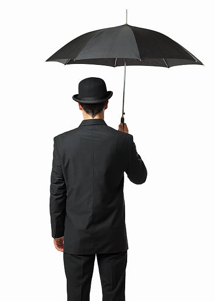 istock Gentleman Holding an Umbrella - Isolated 184122575