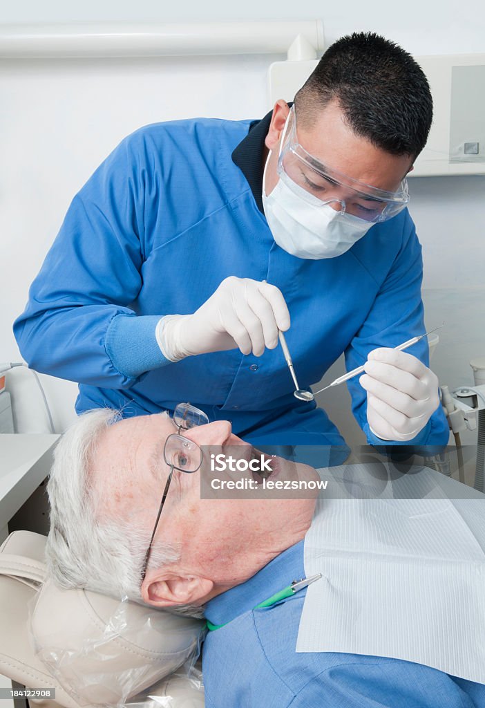 Dentária com Dentista e paciente horário - Foto de stock de Dentista royalty-free