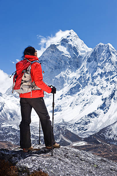 Woman looking at Ama Dablam, Mount Everest National Park