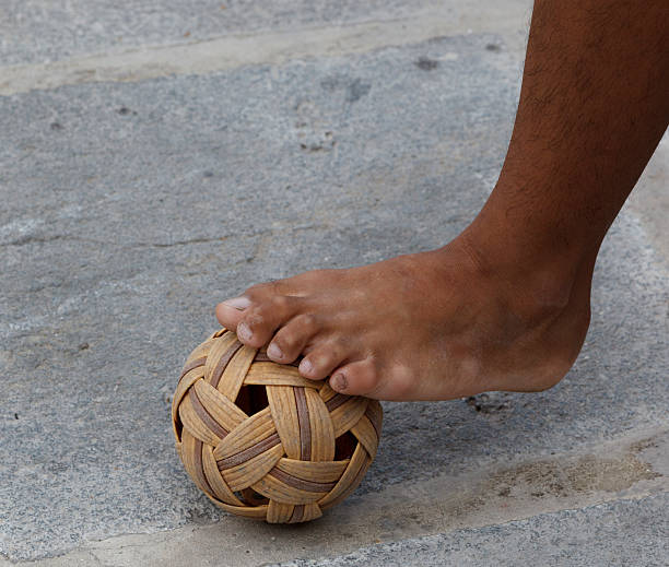 Foot and Rattan ball Sepak takraw stock photo