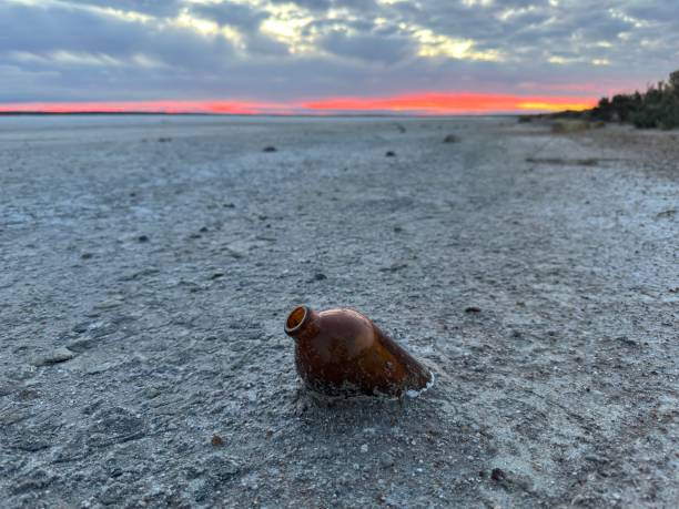 istock Bottle in salt lake, west Australia 1841282039