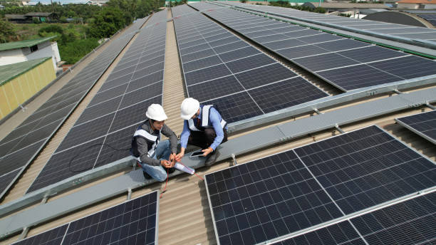 istock Aerial view , Business man with Solar engineer check Solar roof installation project , ecological electricity. Production of renewable energy concept 1841290164