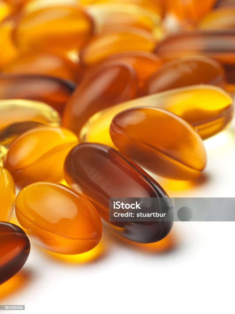 vitamins to go group of gel capsules on white Antioxidant Stock Photo