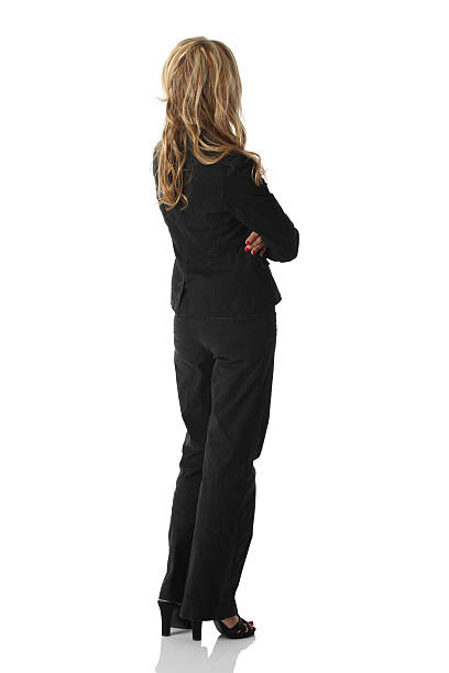 istock Isolated blond businesswoman rear view 184130609