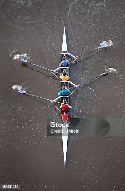 Overhead View Of Men Rowing A Four Person Scull Stock Photo - Download Image Now - Sport Rowing, Rowing, Sports Team