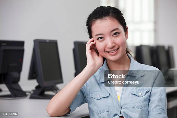 Smilling Girl In Computer Lab Stock Photo - Download Image Now - 20-24 Years, 20-29 Years, Adult