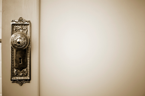 A stock photo of a brass vintage door knob