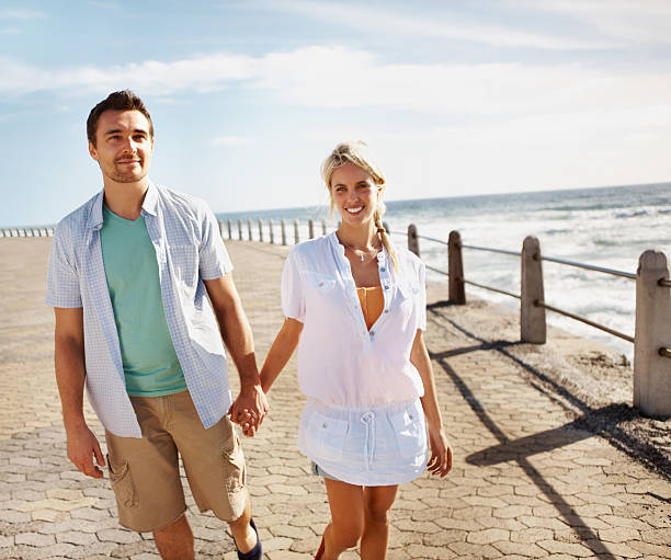 istock Beautiful couple walking on pier 184132773