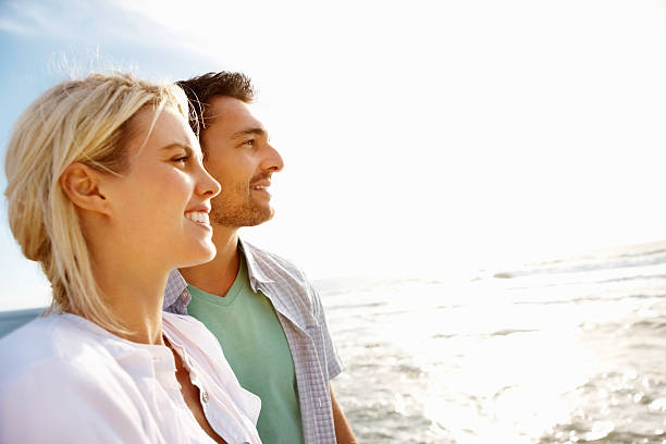 istock Couple enjoying the beach view 184133684