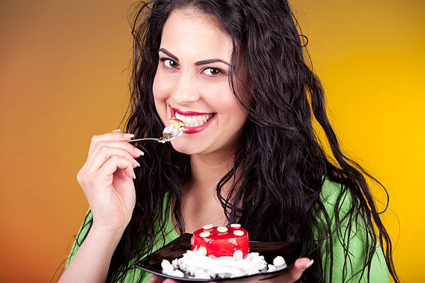 istock woman and cake 184133803