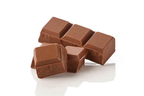 blocchi di cioccolato - chocolate part of portion chocolate shaving foto e immagini stock