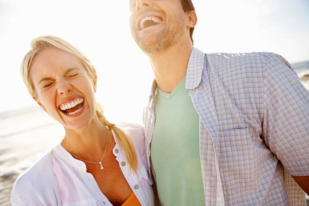 istock Couple having a great time on the beach 184134526