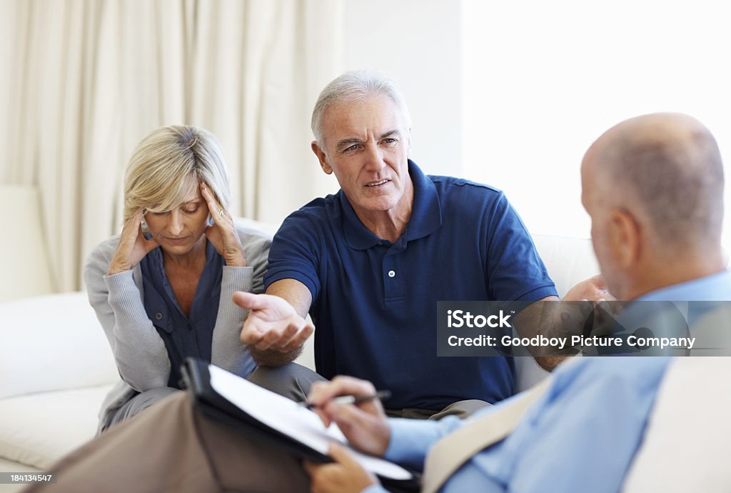 Senior Casal consulta com o Consultor Financeiro - Royalty-free Cliente Foto de stock
