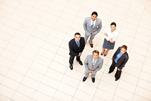 istock Business Team Standing Together and Looking Up 184135002
