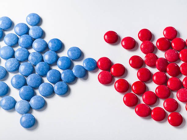 Blue candy with colorful red chocolates