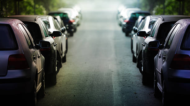 istock Parked cars on twilight street 184136263