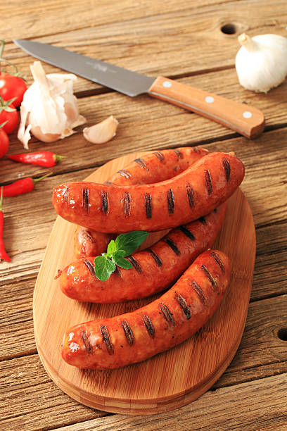 istock Grilled sausages on a cutting board 184136556