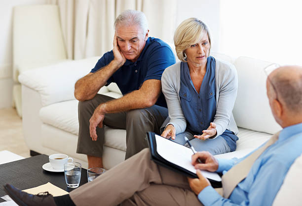 istock Senior couple having a conversation with financial advisor 184136742