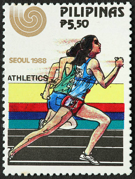 istock women sprinters on vintage Philippines postage stamp 184138154