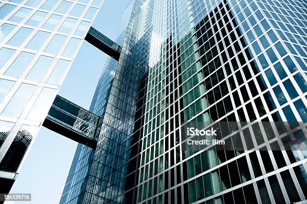 Modern Buildings And Two Elevated Walkways Stock Photo - Download Image Now - Abstract, Architecture, Blue