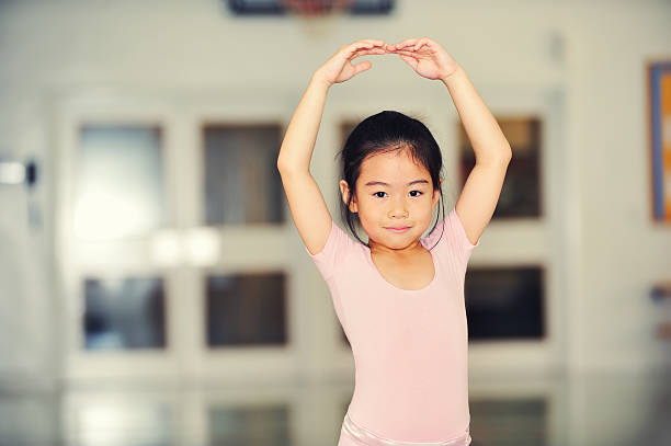 young ballerina in practice stock photo