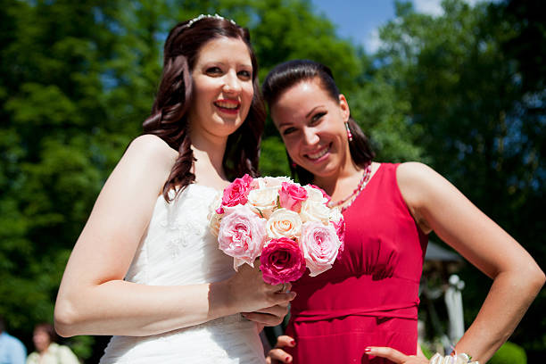 istock Wedding....Young bride and her maid of honour 184140442