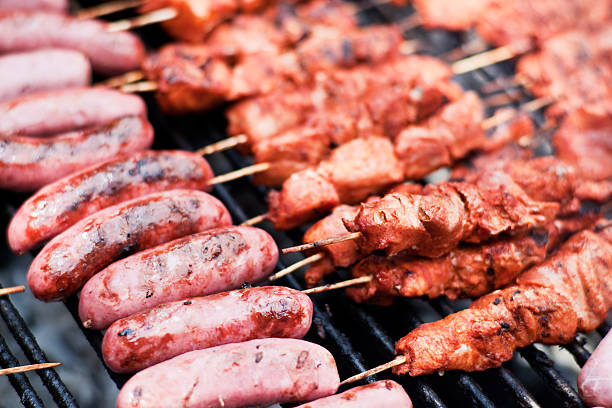 istock Sausages and Kebab grilled on barbecue 184140455