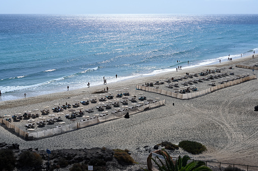 Jandia, Fuerteventura, Spain, November 23, 2023 - Sandy beach Matorral Beach in Morro Jable on Jandia Peninsula, Fuerteventura, Canary Islands, Spain.