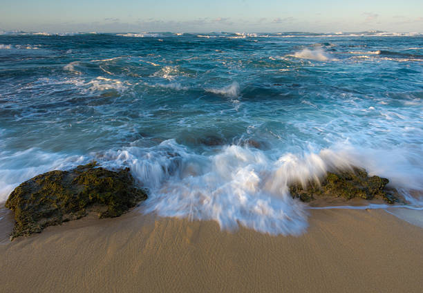 istock Rough seas and incoming waves on Hawaii beach 184140996